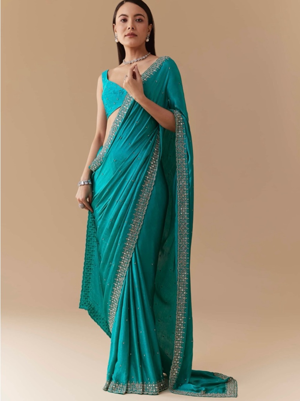 Teal Embellished Saree with Silver Border
